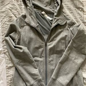 Full zip Lululemon jacket with hood.